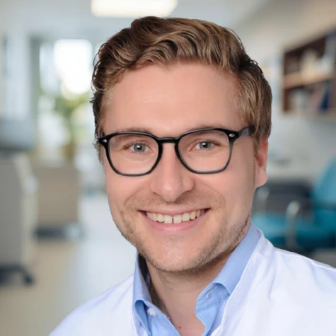 Portrait Arzt im weißen Kittel